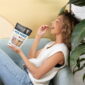 Woman eating Power Up High Energy Trail Mix